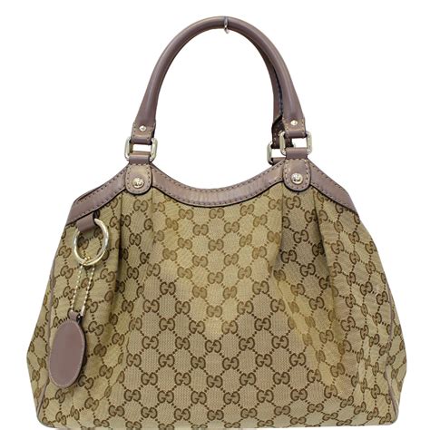 Gucci canvas handbags